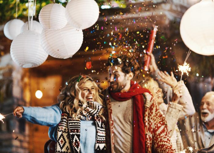 455783_gettyimages_1079856966_family-new-years-eve-party